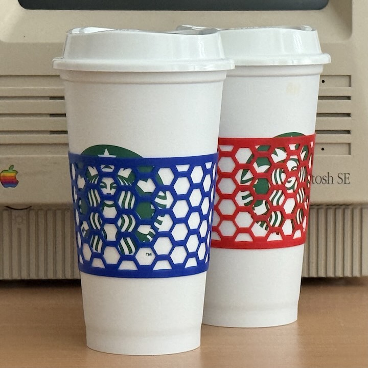 Starbucks reusable coffee cups with 3D printed sleeves